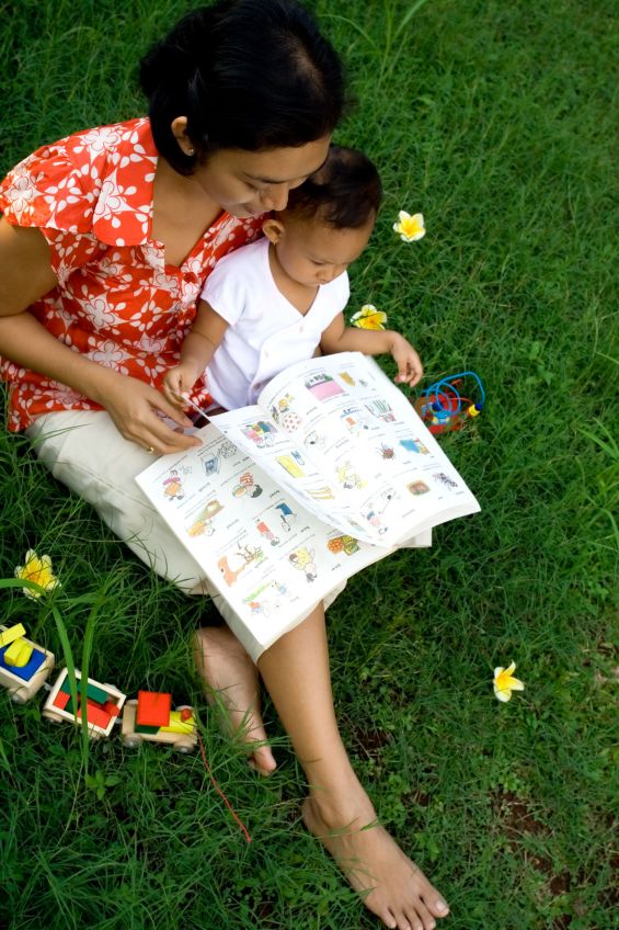 Mom reads with small child